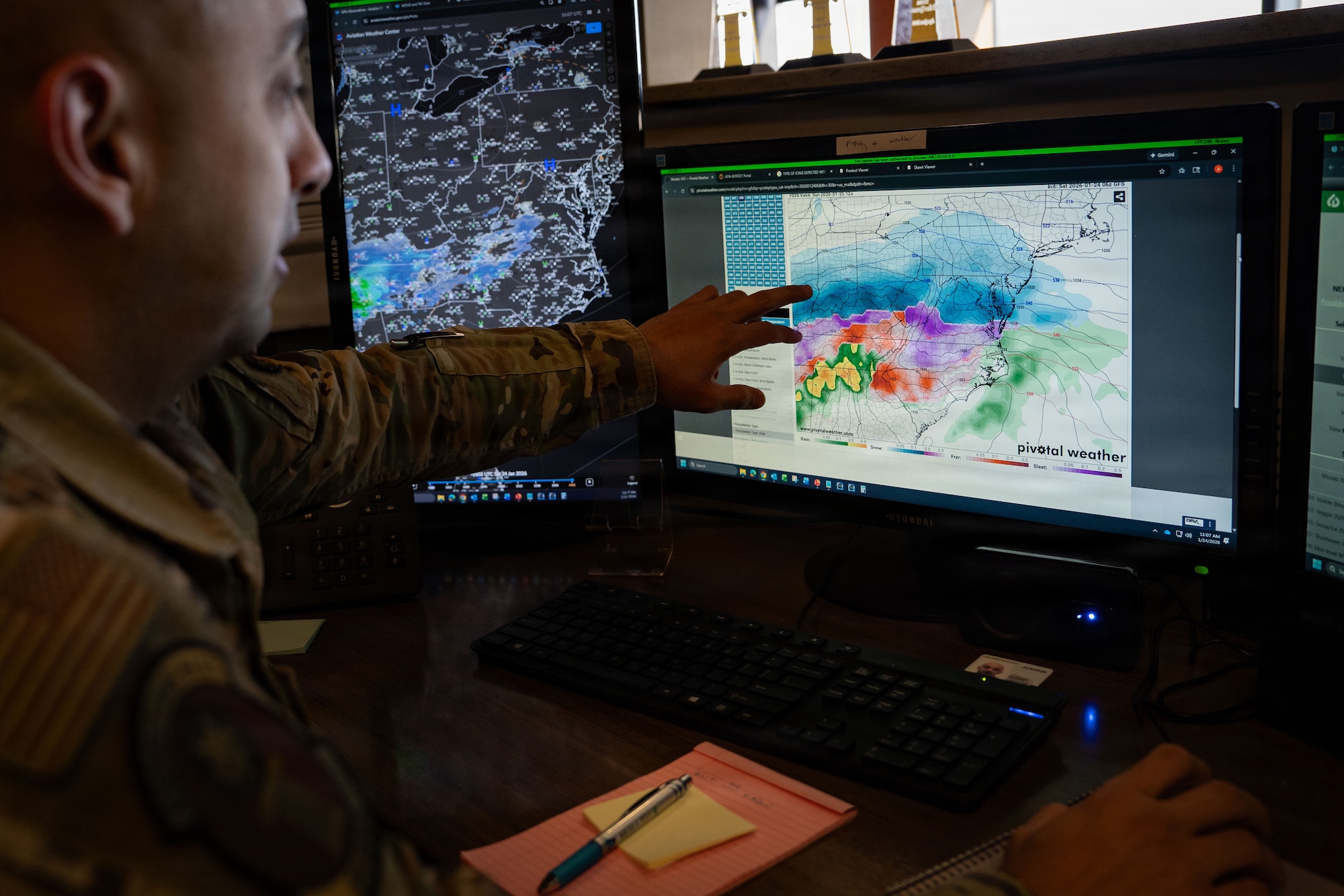 U.S. Air Force Senior Airman Antonio Figueroa, 89th Operations Support Squadron weather forecaster, analyzes weather data at Joint Base Andrews, Md., Jan. 24, 2026. The 89th OSS weather flight worked around the clock, providing real-time analysis directly to Joint Base Andrews senior leaders to inform critical, time-sensitive decisions as the historic storm evolved. (U.S. Air Force photo by 1st Lt. Alexis Kula)