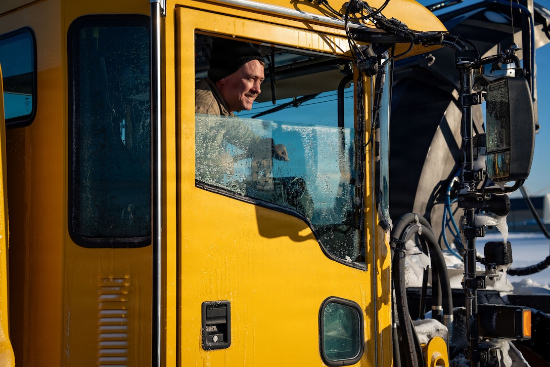 U.S. Air Force Tech. Sgt. Jacob Dewald, 92nd Civil Engineering Squadron civil engineer, Fairchild Air Force Base, Wa., operates heavy snow removal equipment at Joint Base Andrews, Md., Jan. 29, 2026. Air Mobility Command mobilized mission-ready Airmen and specialized equipment in support of winter weather preparedness efforts to ensure “America’s Airfield” remained operational amid historic severe weather impacts. (U.S. Air Force photo by 1st Lt. Alexis Kula)