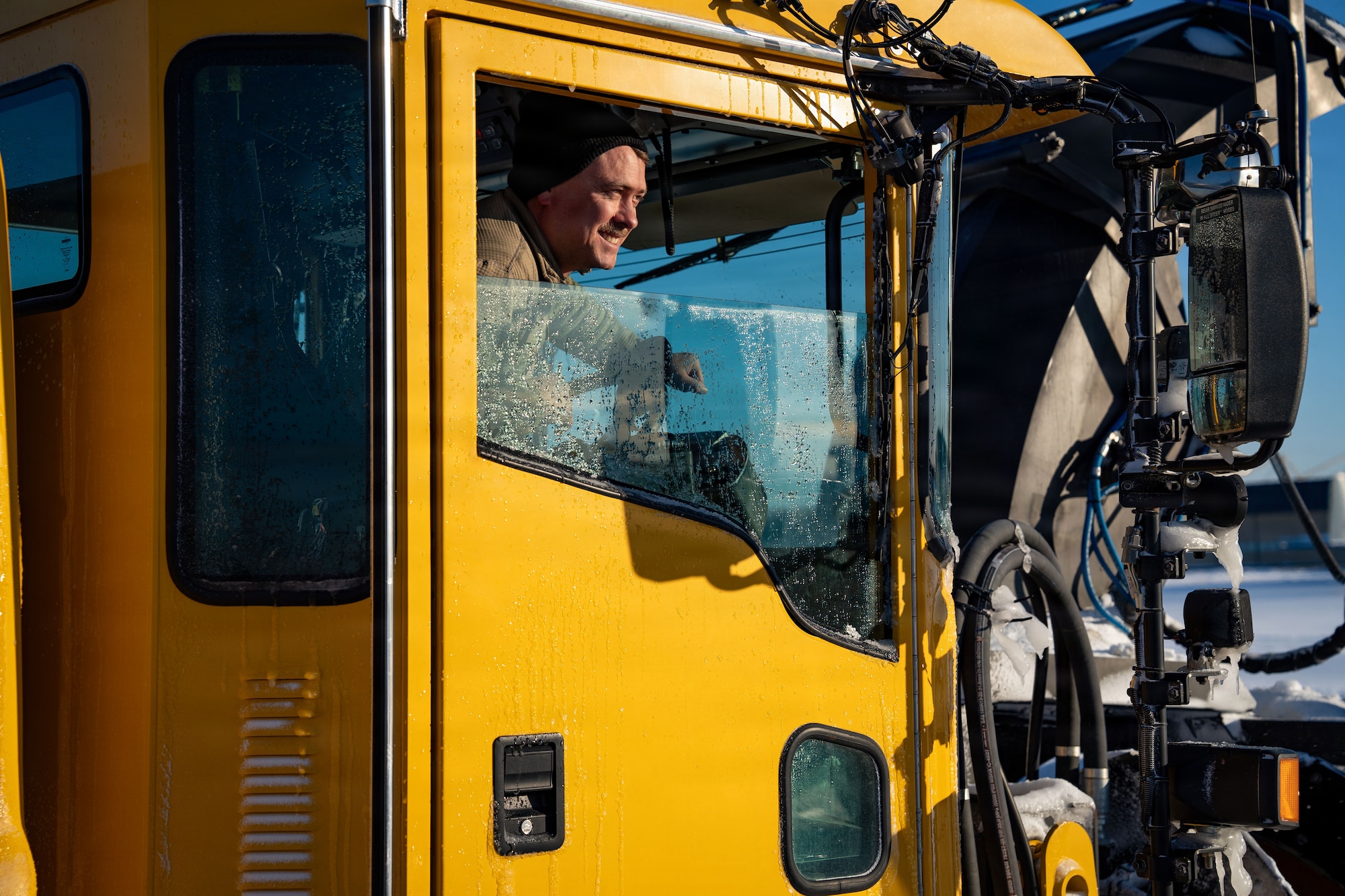 U.S. Air Force Tech. Sgt. Jacob Dewald, 92nd Civil Engineering Squadron civil engineer, Fairchild Air Force Base, Wa., operates heavy snow removal equipment at Joint Base Andrews, Md., Jan. 29, 2026. Air Mobility Command mobilized mission-ready Airmen and specialized equipment in support of winter weather preparedness efforts to ensure “America’s Airfield” remained operational amid historic severe weather impacts. (U.S. Air Force photo by 1st Lt. Alexis Kula)