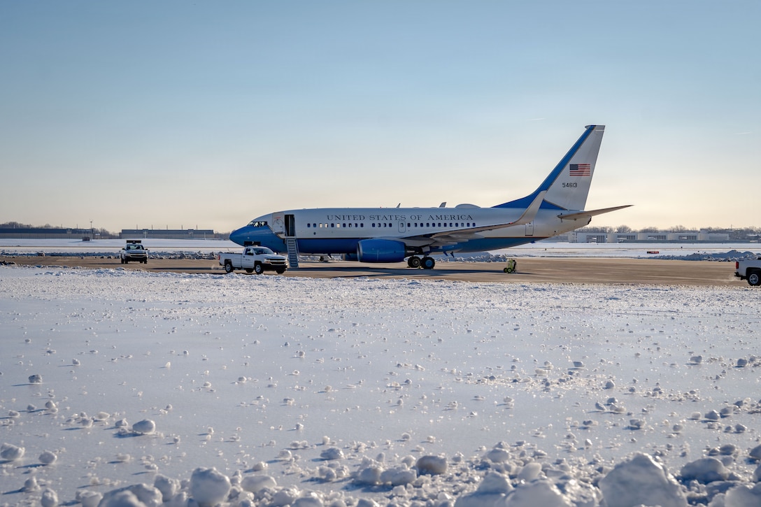 A U.S Air Force C-40 aircraft assigned to the 89th Airlift Wing sits on the airfield at Joint Base Andrews, Md., Jan. 29, 2026, after severe winter storm ‘Fern’ impacted the region. Air Mobility Command mobilized mission-ready Airmen and specialized equipment in support of winter weather preparedness efforts to ensure “America’s Airfield” remained operational amid historic severe weather impacts. (U.S. Air Force photo by 1st Lt. Alexis Kula)