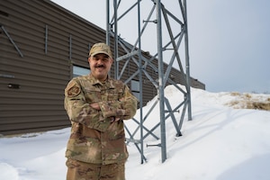 Warrant Officer Johnny Cruz poses for a photo.
