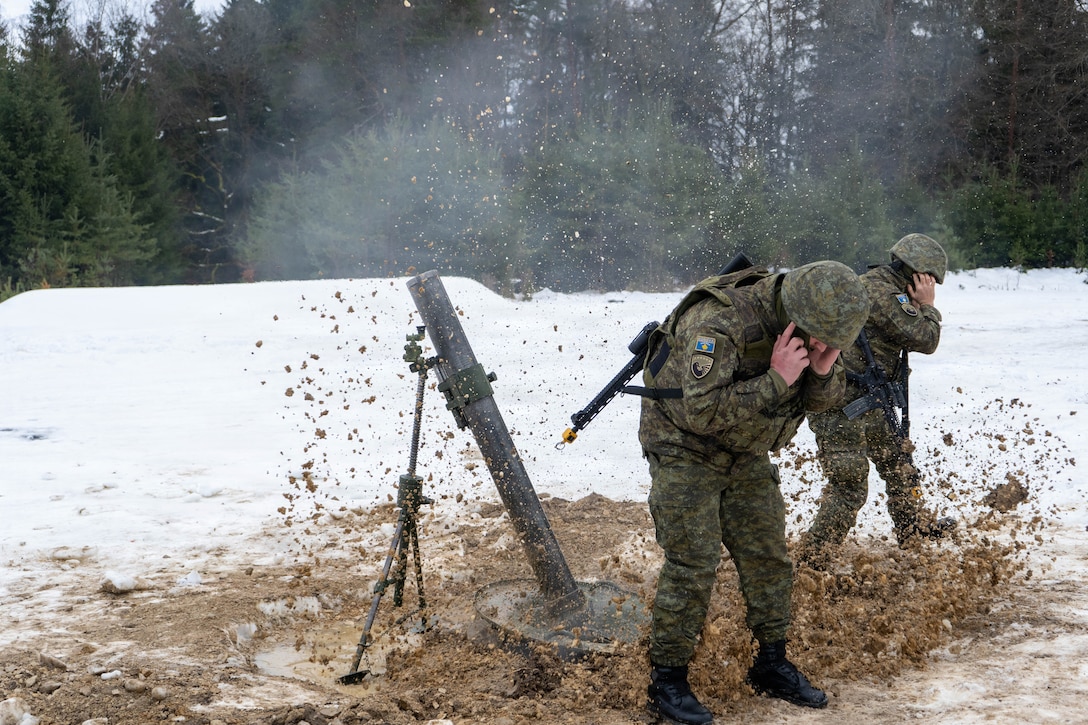 Members of the Kosovo Security Force fire mortar rounds during live fire training as part of command post exercise Dynamic Front at Grafenwoehr Training Area, Germany, Feb. 7, 2026.