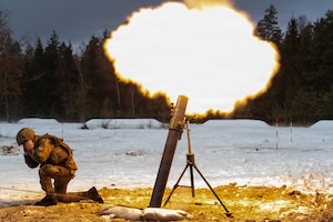 Members of the Kosovo Security Force fire mortar rounds during live fire training as part of command post exercise Dynamic Front at Grafenwoehr Training Area, Germany, Feb. 7, 2026.