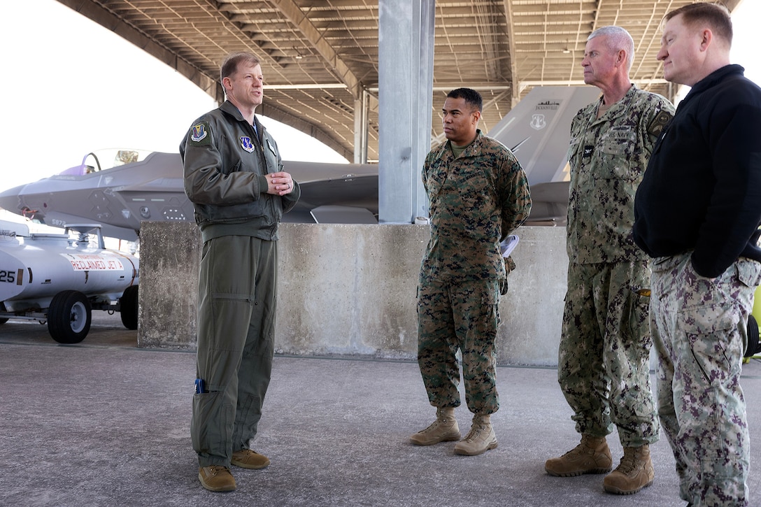 U.S. Air Force Col. David Siemion, deputy commander of the 125th Fighter Wing, explains the capabilities of an F-35A Lightning II to Marine Corps Col. David Merles of Marine Corps Support Facility Blount Island, Navy Capt. Bill Dull of Naval Submarine Base Kings Bay, and Navy Capt. Craig Malloy of Navy Medicine Readiness and Training Command Jacksonville during a mission briefing and tour Feb. 6, 2026, at Jacksonville Air National Guard Base, Florida. The visit brought Navy and Marine Corps commanders together to strengthen joint readiness and regional partnerships. Siemion, a command pilot with combat experience in the F-15C, highlighted the aircraft’s controls and advances from prior generations. (Official Marine Corps photo by Dustin Senger)