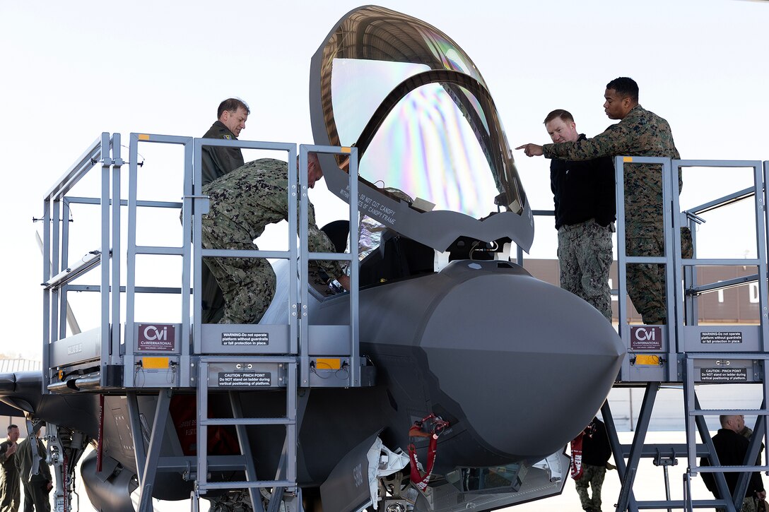 U.S. Navy and Marine Corps commanders look into the cockpit of an F-35A Lightning II during a flightline tour Feb. 6, 2026, at Jacksonville Air National Guard Base, Florida. The visit to the 125th Fighter Wing focused on strengthening joint readiness and regional partnerships through firsthand familiarization with fifth-generation airpower capabilities. The first aircraft’s arrival in July 2025 marked a milestone in the wing’s transition from the F-15C/D Eagles. (Official Marine Corps photo by Dustin Senger)