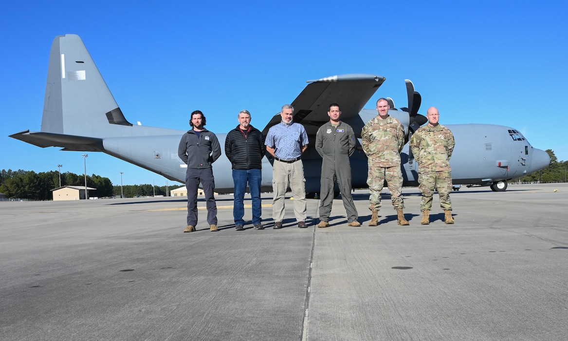 A group of people pose for a photo.