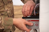 Airmen Maintain Fixed Base Weather Observation System