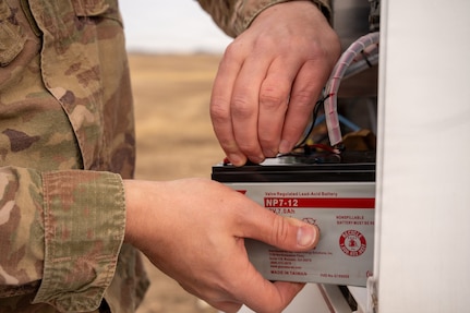 Airmen Maintain Fixed Base Weather Observation System