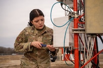Airmen Maintain Fixed Base Weather Observation System