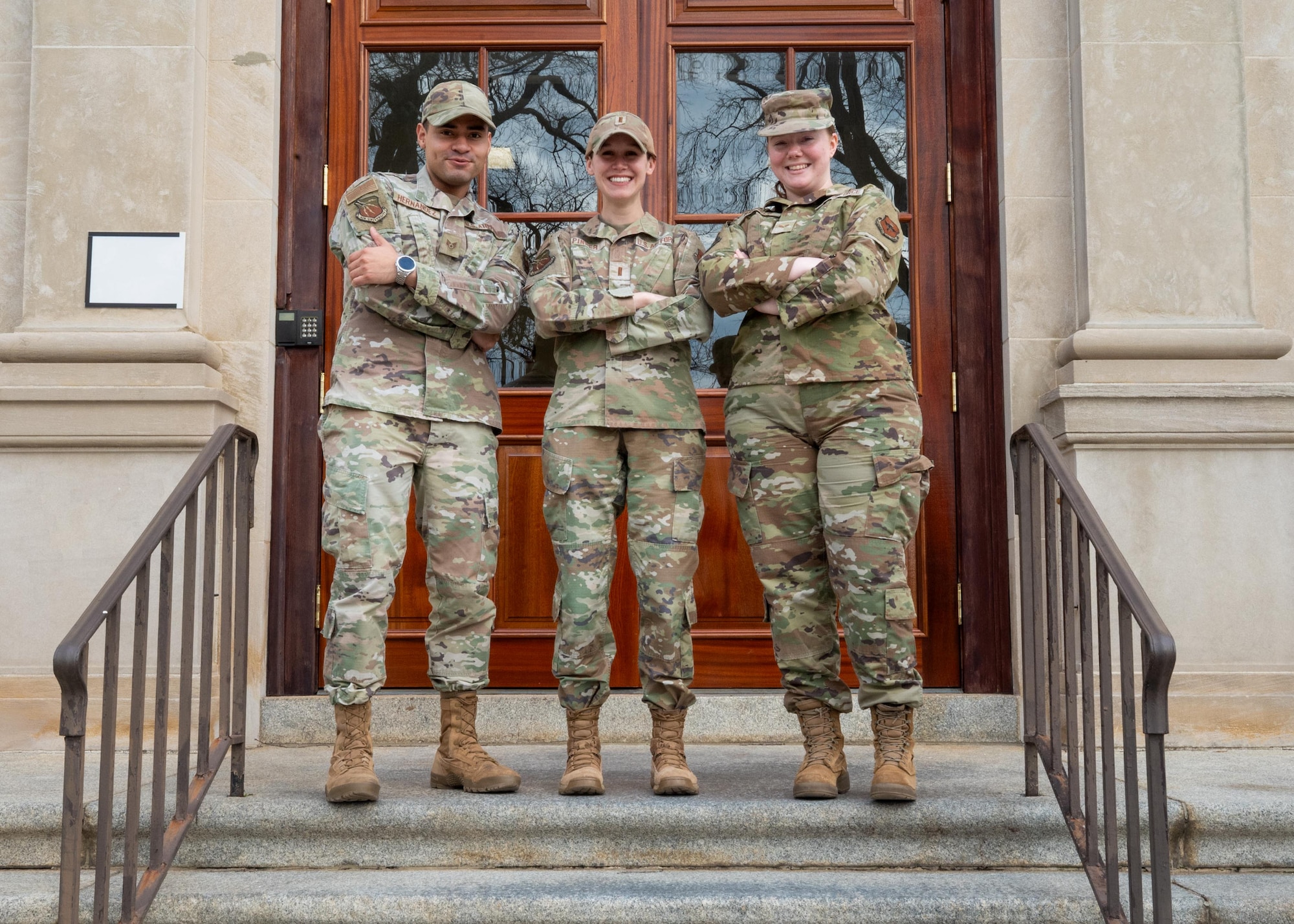 From left, U.S. Air Force Staff Sgt. Steven Hernandez, Air University commander’s support staff noncommissioned officer in charge, 2nd Lt. Shelby Pinner, AU CSS officer in charge, and Senior Airman Gabriella Mayfield, AU CSS technician, pose for a photo at Maxwell Air Force Base, Alabama, Feb. 3, 2026.
