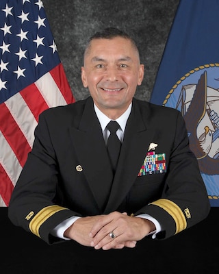 Rear Adm. Cuadros Bio Photo