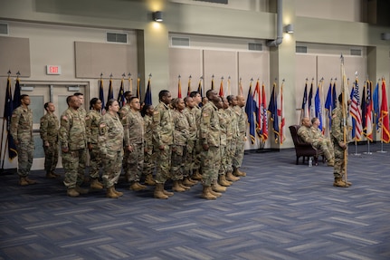 U.S. Army Soldiers of the Marietta-based 93rd Financial Management Support Detachment, 781st Troop Command Detachment, 78th Troop Command, Georgia Army National Guard, stand in formation during the opening remarks of the unit's departure ceremony at Clay National Guard Center, Marietta, Georgia, Feb. 7, 2026.
