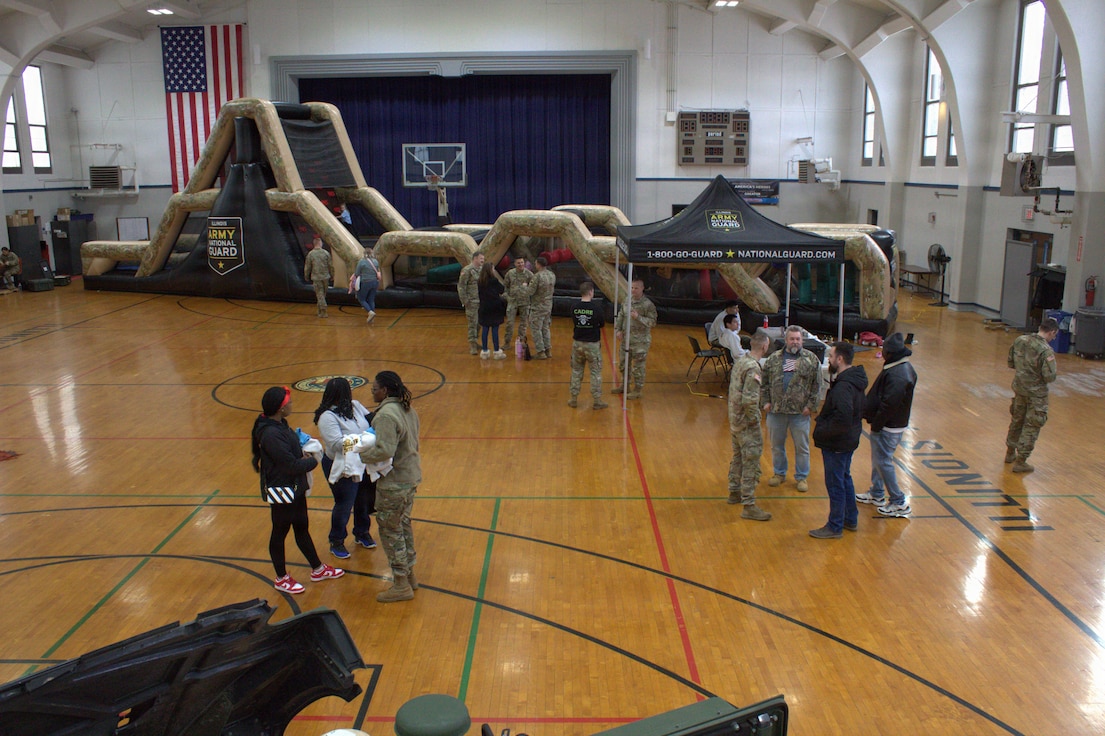 Alpha Battery, 2-122nd Field Artillery teamed with the Illinois Army National Guard's Recruiting and Retention Command to hold an open house at the Sycamore Armory.