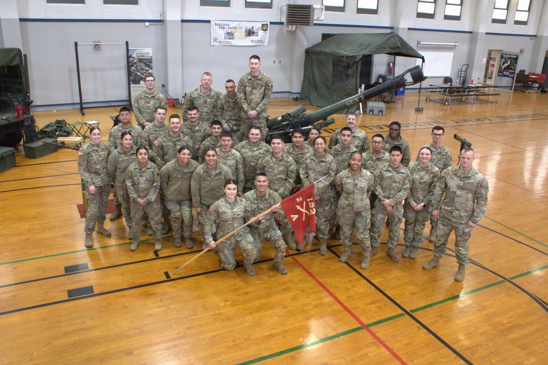 Soldiers with Alpha Battery, 2nd Battalion, 122nd Field Artillery Regiment, and the Illinois Army National Guard Recruiting and Retention Battalion pose for a group photo.