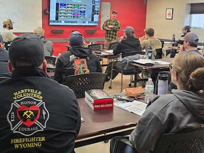 Members of the Wyoming National Guard’s Training Center Command attend the S-290 Intermediate Wildland Fire Behavior course at the Southeast Wyoming Wildland Academy, where instructors lead discussion on evaluating fuels, weather and terrain.