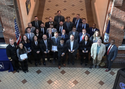 NSWCPD Commanding Officer Capt. Joseph Darcy (far left) and Technical Director Nigel C. Thijs, SES (far right), stand with the 2025 Command Awards recipients during the annual Command Awards Ceremony at the Navy Yard in Philadelphia on January 13, 2026. The event honored individuals and teams for their outstanding dedication, innovation, and leadership in advancing the command’s mission and supporting the fleet.
 (U.S. Navy photo by Phillip Scaringi, CTR)