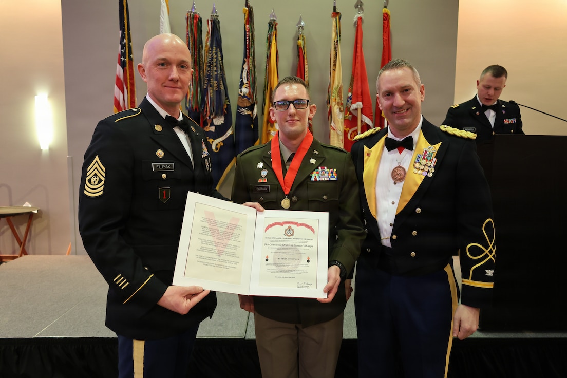 Capt. Devin J. Tegtman receives the Order of Samuel Sharpe during the 33rd Infantry Brigade Combat Team Military Ball, Feb. 7.