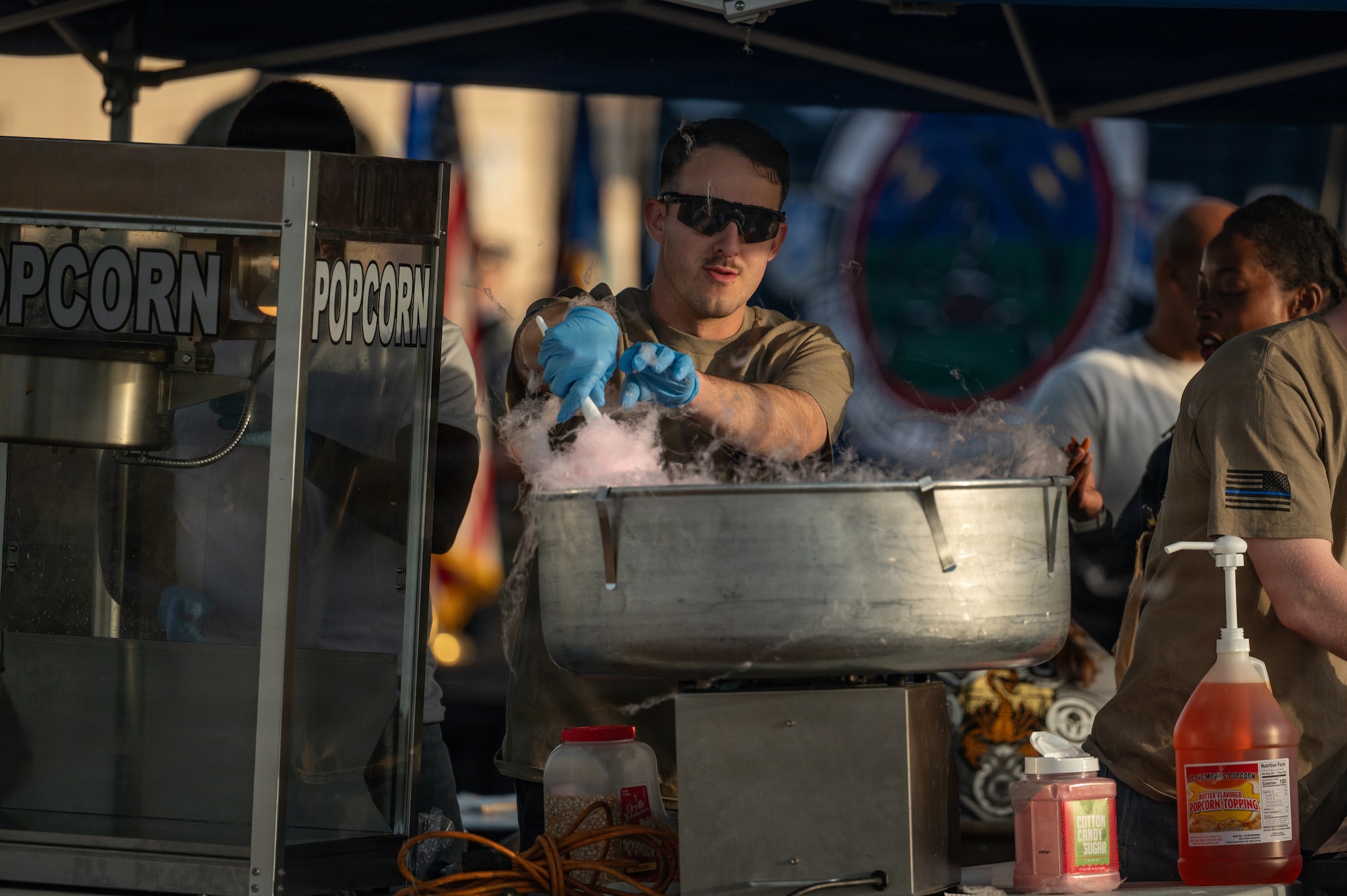 a man makes cotton candy
