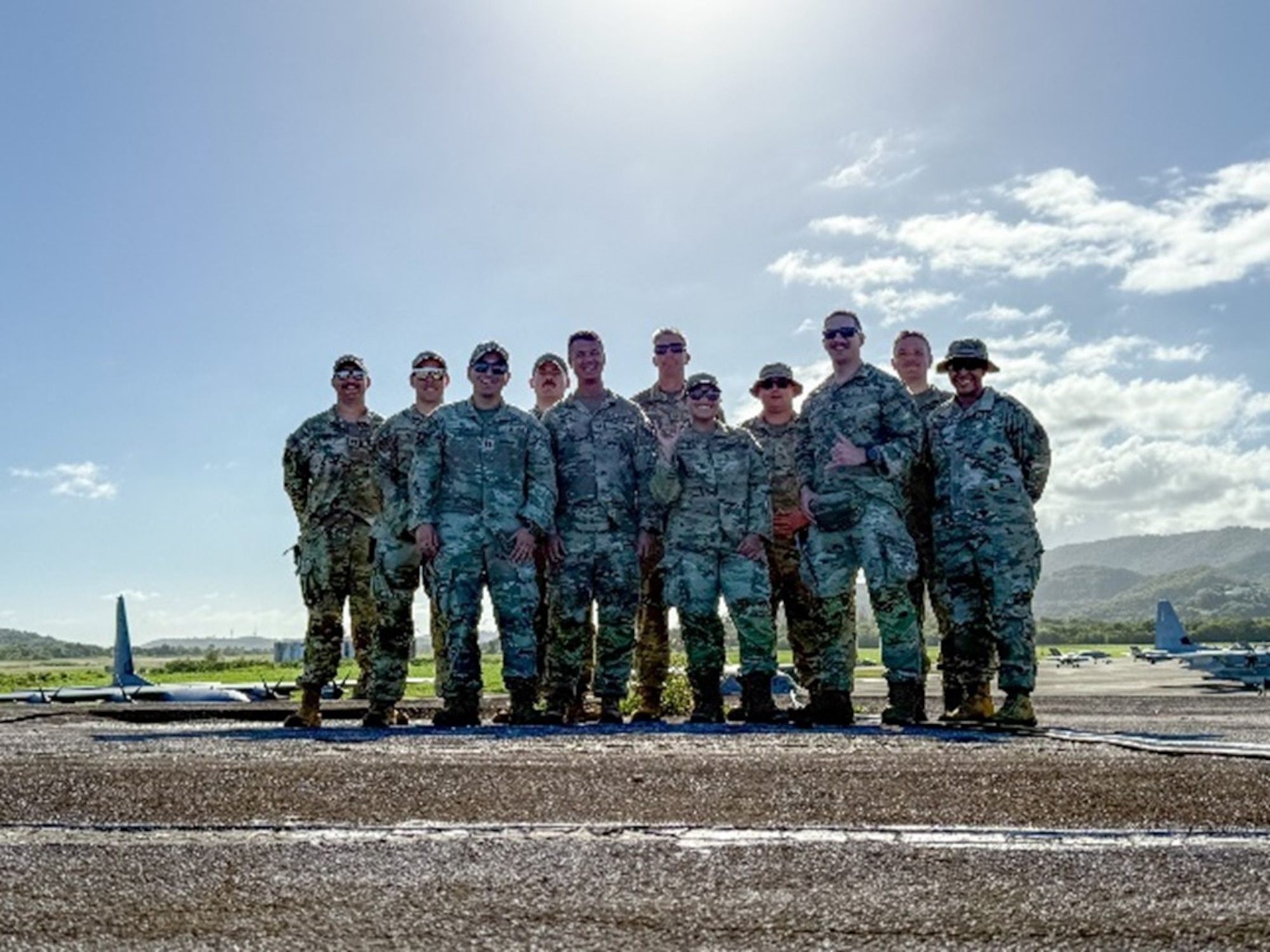 U.S. Service members pose for a photo.