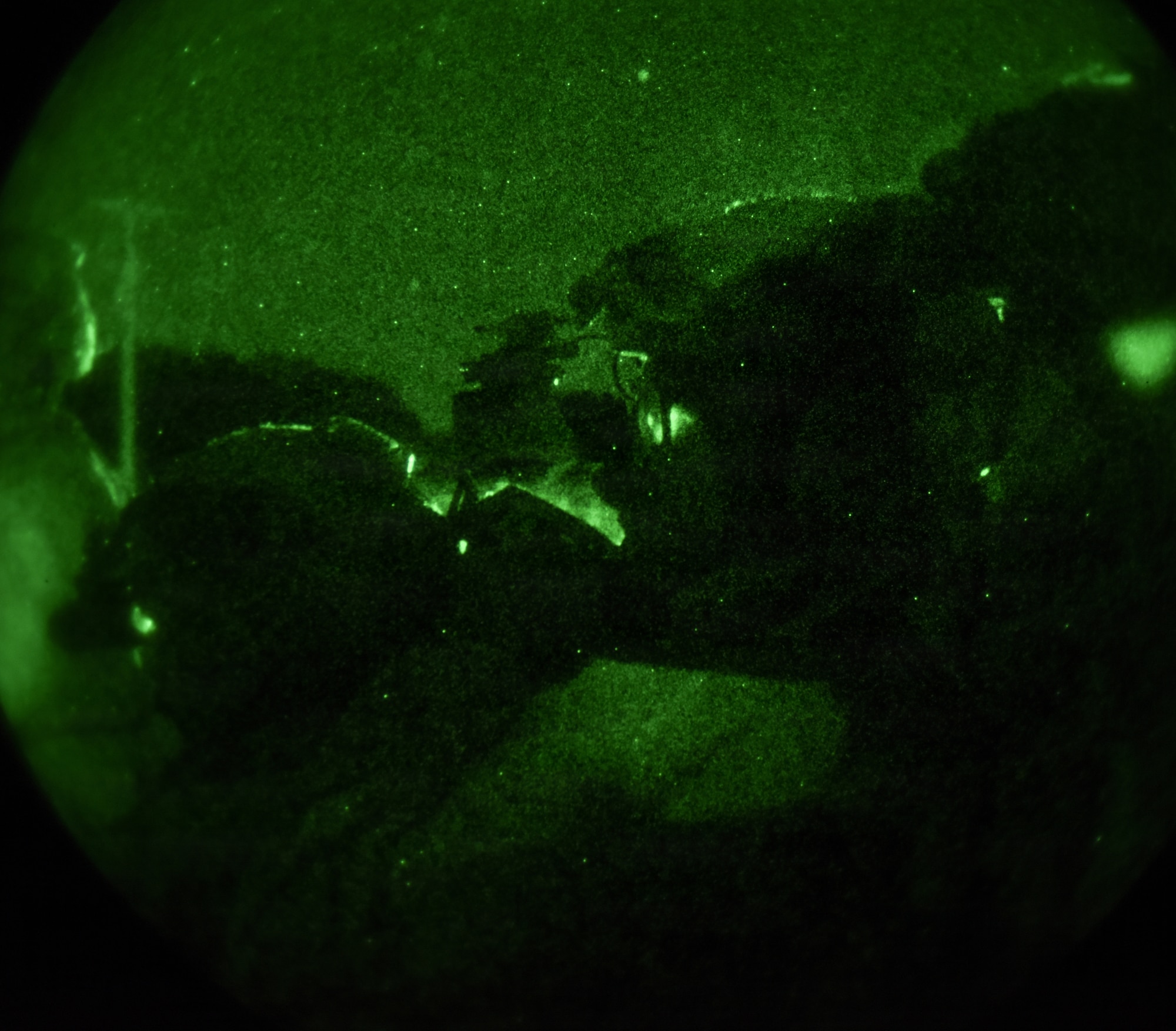 U.S. Air Force explosive ordnance disposal technicians, 4th Civil Engineer Squadron,  perform rescue night operations during a Field Training Exercise at Seymour Johnson Air Force Base, North Carolina, Jan. 22, 2026. EOD plays a crucial role in the Air Force's mission, serving as a lifeline for safety and a key element in tactical rescue operations. (U.S. Air Force photo by Airman First Class Holly Leonard)