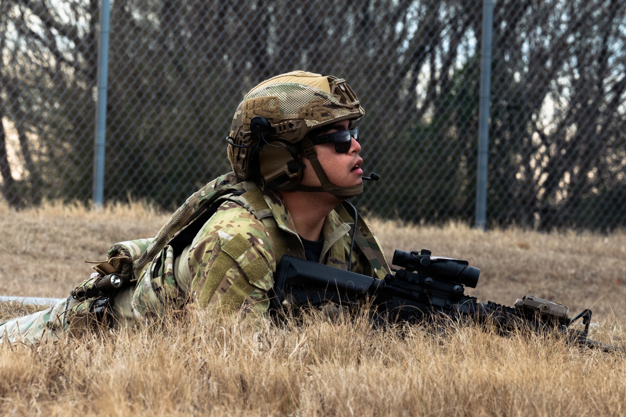 U.S. Air Force Senior Airman Eric Ruiz, 4th Civil Engineer Squadron, explosive ordnance disposal technician, guards his team during a Field Training Exercise at Seymour Johnson Air Force Base, North Carolina, Jan. 21, 2026. EOD plays a crucial role in the Air Force's mission, serving as a lifeline for safety and a key element in tactical rescue operations. (U.S. Air Force photo by Airman First Class Holly Leonard)