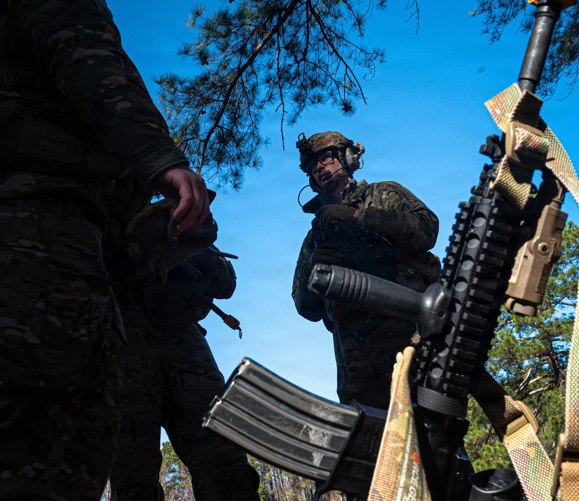 U.S. Air Force Staff Sgt. Ian Chromy, 4th Civil Engineer Squadron, explosive ordnance disposal technician, plans with his team during a Field Training Exercise at Seymour Johnson Air Force Base, North Carolina, Jan. 22, 2026. The FTX was organized by Tech Sgt. Adam King to provide the airmen under his command with an opportunity to gain in-depth training on how EOD responds to real-world crises in hostile environments. (U.S. Air Force photo by Airman First Class Holly Leonard)