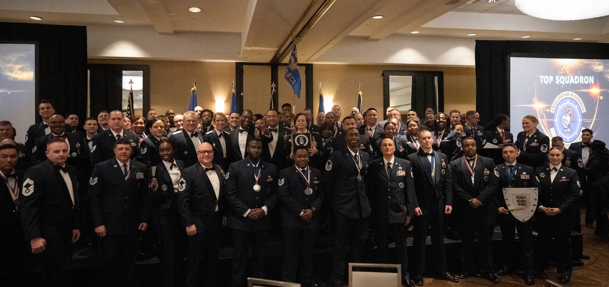 350th Recruiting Squadron, Joint Base McGuire-Dix-Lakehurst, New Jersey, pose after earning Top Squadron from the 367th Recruiting Group, Robins Air Force Base, Georgia, at the FY25 Annual Award Ceremony Jan 29, 2026, in St. Louis, Missouri. The Recruiting Training Event held Jan 25-30, 2026, trained AFR recruiters and celebrated recruiting accomplishments over FY25 after exceeding the AFR recruiting goal of 7,600 for a second consecutive year. (U.S. Air Force photo by Tech. Sgt. Della Creech)