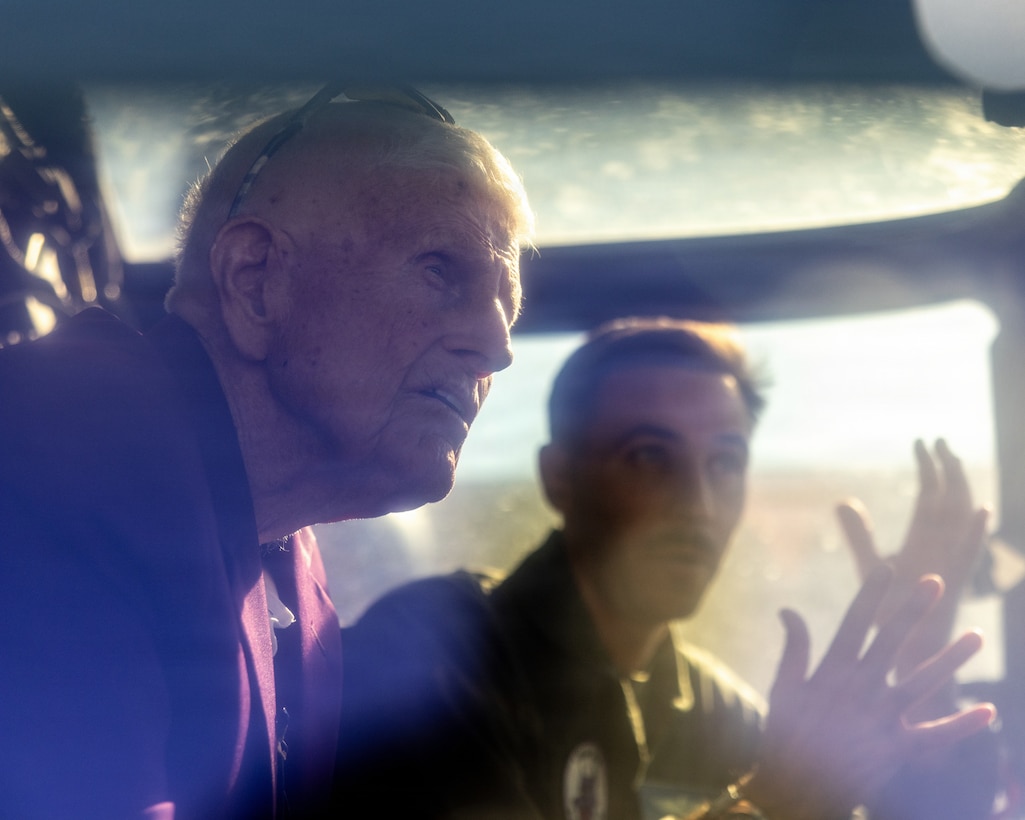 U.S. Marine Corps Maj. Bussick, the executive officer of Marine Medium Tiltrotor Squadron (VMM) 364, Marine Aircraft Group 39, 3rd Marine Aircraft Wing, discusses the operations of an MV-22B Osprey with U.S. Marine Corps veteran, Capt. Nelson J. Baker, at Marine Corps Air Station Camp Pendleton, California, Jan. 30, 2026. Baker is a plank holder of VMM-364 and served as one of the squadron’s first pilots when it was commissioned as Marine Medium Helicopter Squadron (HMM) 364 in 1961. He visited to share the squadron’s legacy with the current generation of Marines who work with and fly the MV-22B Osprey. (U.S. Marine Corps photo by Lance Cpl. Jonathan Sherchand)