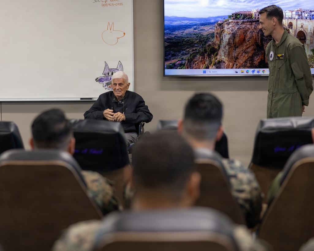U.S. Marine Corps veteran, Capt. Nelson J. Baker, speaks with Marines with Marine Medium Tiltrotor Squadron (VMM) 364, Marine Aircraft Group 39, 3rd Marine Aircraft Wing, at Marine Corps Air Station Camp Pendleton, California, Jan. 30, 2026. Baker is a plank holder of VMM-364 and served as one of the squadron’s first pilots when it was commissioned as Marine Medium Helicopter Squadron (HMM) 364 in 1961. He visited to share the squadron’s legacy with the current generation of Marines who work with and fly the MV-22B Osprey. (U.S. Marine Corps photo by Lance Cpl. Jonathan Sherchand)
