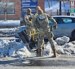 Oklahoma National Guardsmen deployed in support of the D.C. Safe and Beautiful mission as part of Task Force Thunder clear snow and ice from walkways around Washington, D.C., after Winter Storm Fern. Courtesy photo.