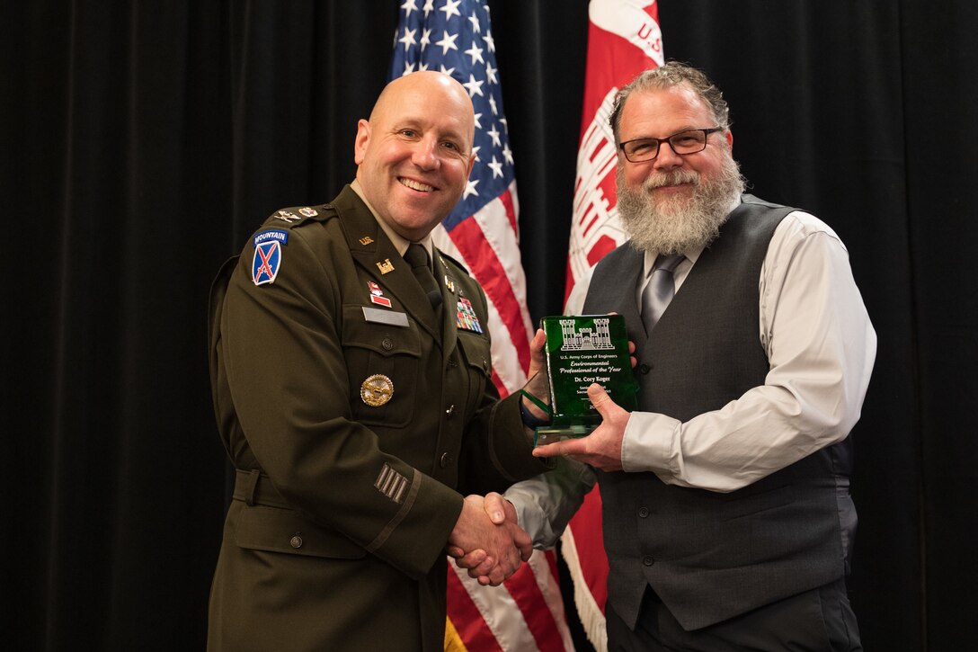 Dr. Cory Koger, Sacramento District senior chemist and water quality program manager, receives the Environmental Professional of the Year award Feb. 6 during the U.S. Army Corps of Engineers Sacramento District Annual Awards Ceremony. The national-level award recognizes more than 24 years of leadership in environmental cleanup, habitat restoration and emergency wildfire response.