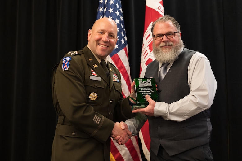 Dr. Cory Koger, Sacramento District senior chemist and water quality program manager, receives the Environmental Professional of the Year award Feb. 6 during the U.S. Army Corps of Engineers Sacramento District Annual Awards Ceremony. The national-level award recognizes more than 24 years of leadership in environmental cleanup, habitat restoration and emergency wildfire response.