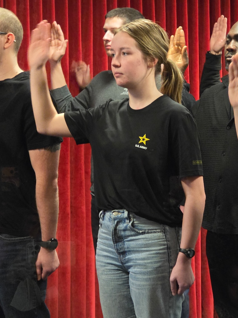 Holly Stahlhut, daughter of Travis Stahlhut, USMEPCOM management analyst and US Army Veteran, takes the oath of enlistment at Chicago MEPS. A legacy of service extended a generation when Holly Stahlhut enlisted into the US Army at Chicago MEPS on Jan. 13, 2026.