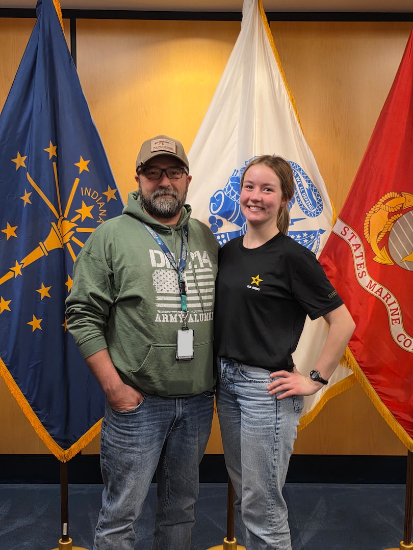 Travis Stahlhut, USMEPCOM management analyst and US Army veteran, poses with his daughter, Holly, after her own oath of enlistment at Chicago MEPS. A legacy of service extended a generation when Holly Stahlhut enlisted into the US Army at Chicago MEPS on Jan. 13, 2026.
