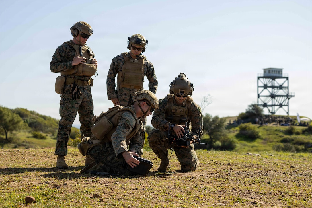 U.S. Marines with I Marine Expeditionary Force prepare a first-person view small unmanned aircraft system during an FPV sUAS live fire demonstration at Marine Corps Base Camp Pendleton, California, Jan. 29, 2026. I Marine Expeditionary Force, in partnership with Defense Innovation Unit, evaluated fiber-optic drones for use in signal-degraded environments. (U.S. Marine Corps photo by Cpl. Joshua Bustamante)