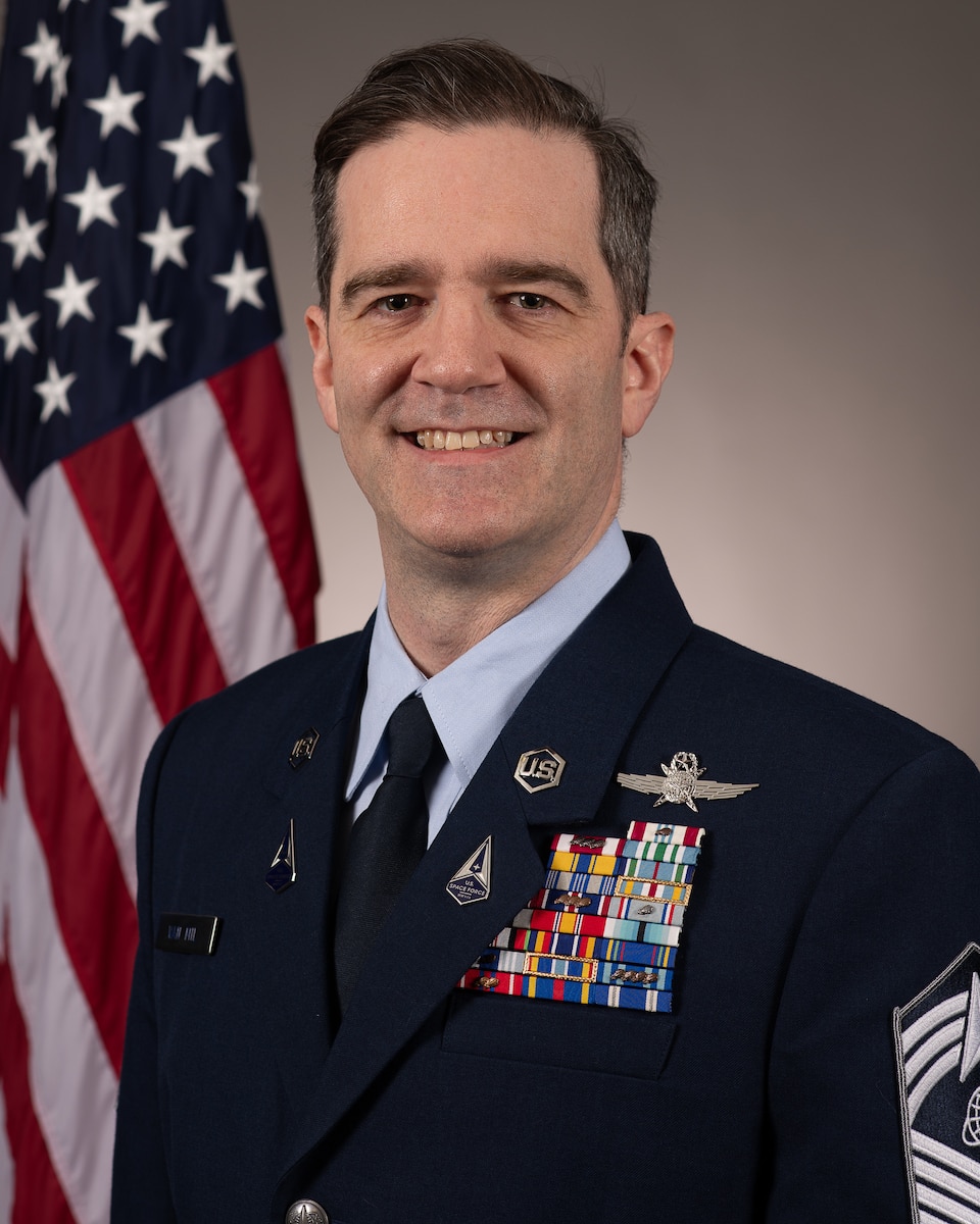 Man in uniform smiling