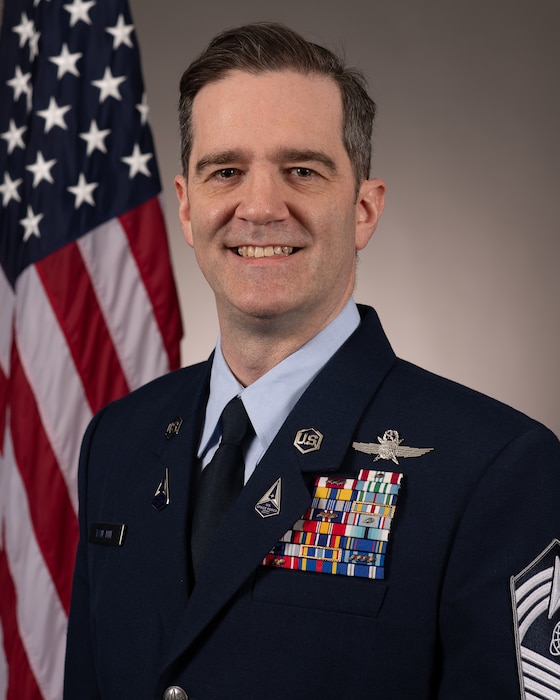 Man in uniform smiling