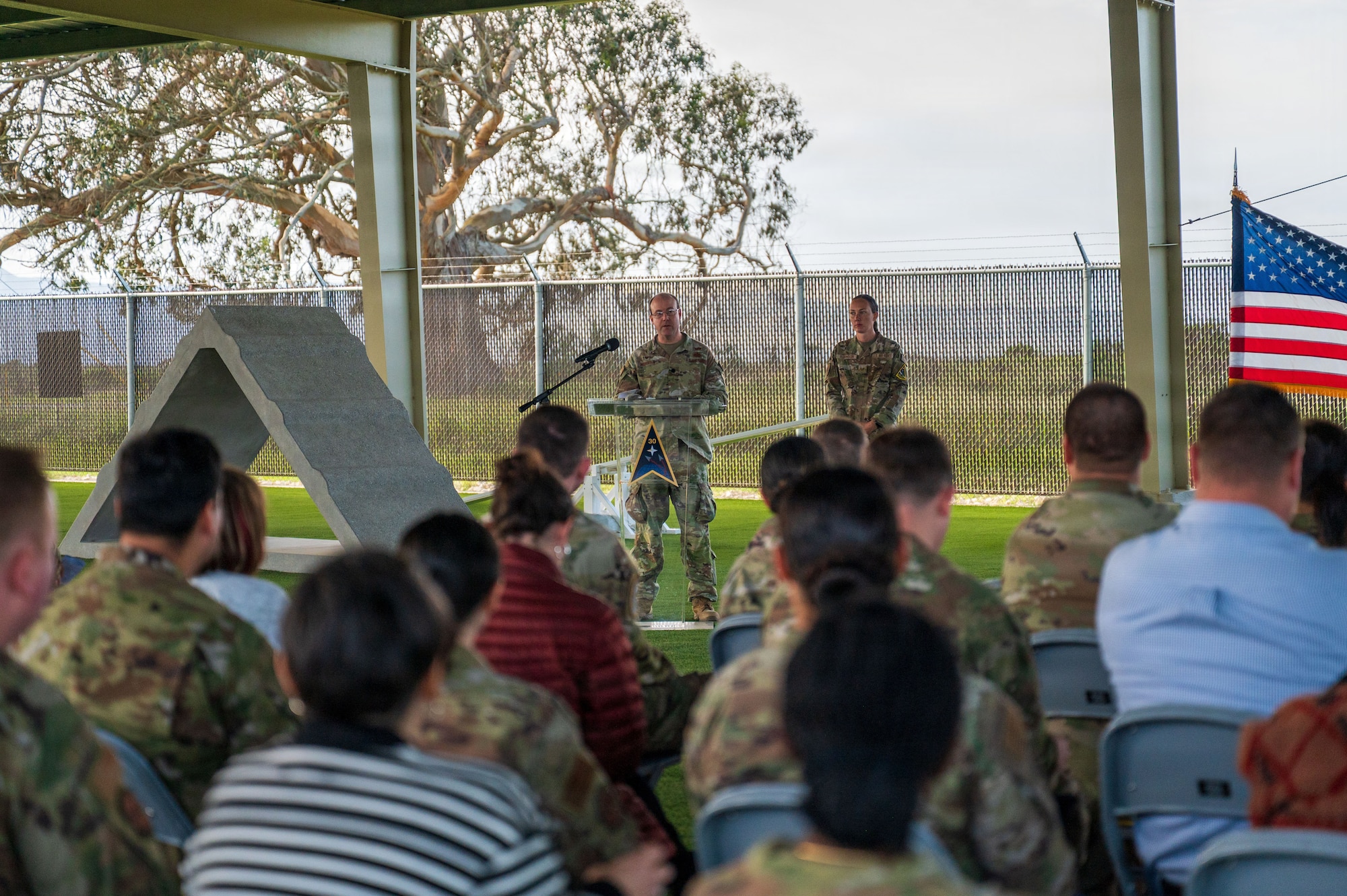 People talk outside.