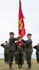 U.S. Marine Corps Brig. Gen. Robert Brodie, right, the offgoing commanding general of 3rd Marine Expeditionary Brigade, holds the command colors before passing them on to Brig. Gen. Ryan Hoyle, the oncoming commanding general of 3rd MEB, Camp Courtney, Okinawa, Japan, Feb. 6, 2026.