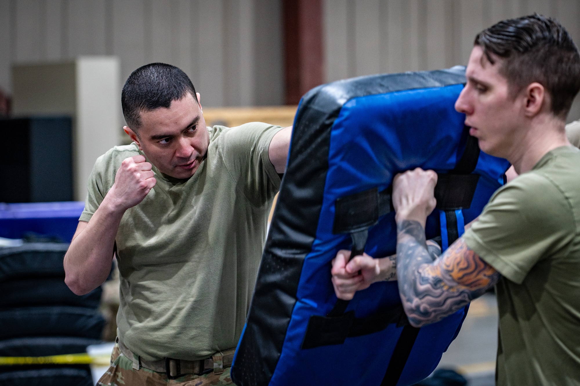 U.S. Air Force Staff Sgt. Steven Castillo, 773d Civil Engineer Squadron contract officer’s representative, practices striking during a combatives class in the Mission Ready Airman training portion of the Professional Development Center’s Noncommissioned Officer Foundation Course 500 at Joint Base Elmendorf-Richardson, Alaska, Feb. 6, 2026. The MRA training is the first in Pacific Air Forces, allowing foundation course students to refresh their knowledge of warfighting skills, such as combatives, land navigation, use-of-force and land mobile radio systems. (U.S. Air Force photo by Senior Airman Hunter Hites)