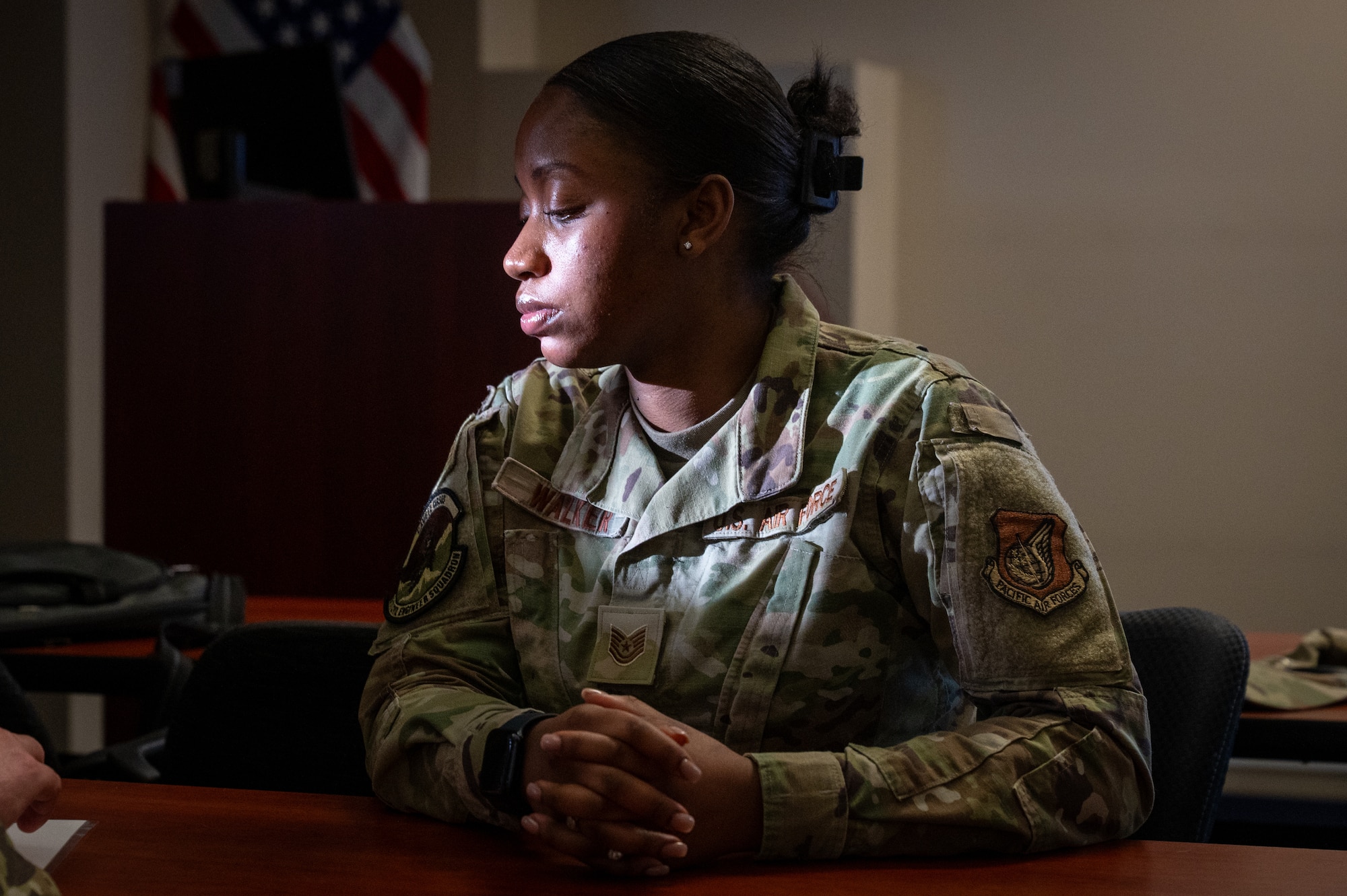 U.S. Air Force Tech. Sgt. Alexis Walker, 611th Civil Engineer Squadron operations manager, watches the instructor use a radio during the land mobile radio training in the Mission Ready Airman training portion of the Professional Development Center’s Noncommissioned Officer Foundation Course 500 at Joint Base Elmendorf-Richardson, Alaska, Feb. 6, 2026. The training reinforces clear, disciplined communication to support command and control during operations. (U.S. Air Force photo by Senior Airman Hunter Hites)