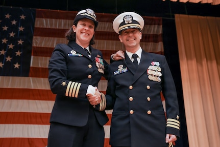 NORFOLK, Va. (Jan. 9, 2026) – Capt. Sarah T. Self-Kyler, commanding officer of Navy Public Affairs Command (NPAC), left, and Cmdr. Jason S. Fischer, commanding officer of Fleet Public Affairs Center (FLTPACEN) Norfolk, pose for a photo during an establishment ceremony at Naval Station Norfolk, Jan. 9, 2026. The establishment ceremony coincided with the inauguration of Navy Public Affairs Command, formerly Navy Public Affairs Support Element, and is part of a Navy-wide public affairs transformation designed to better align communication efforts with the fleet and to create a more agile and efficient communication force. (U.S. Navy photo by Mass Communication Specialist 2nd Class Troy Davis)