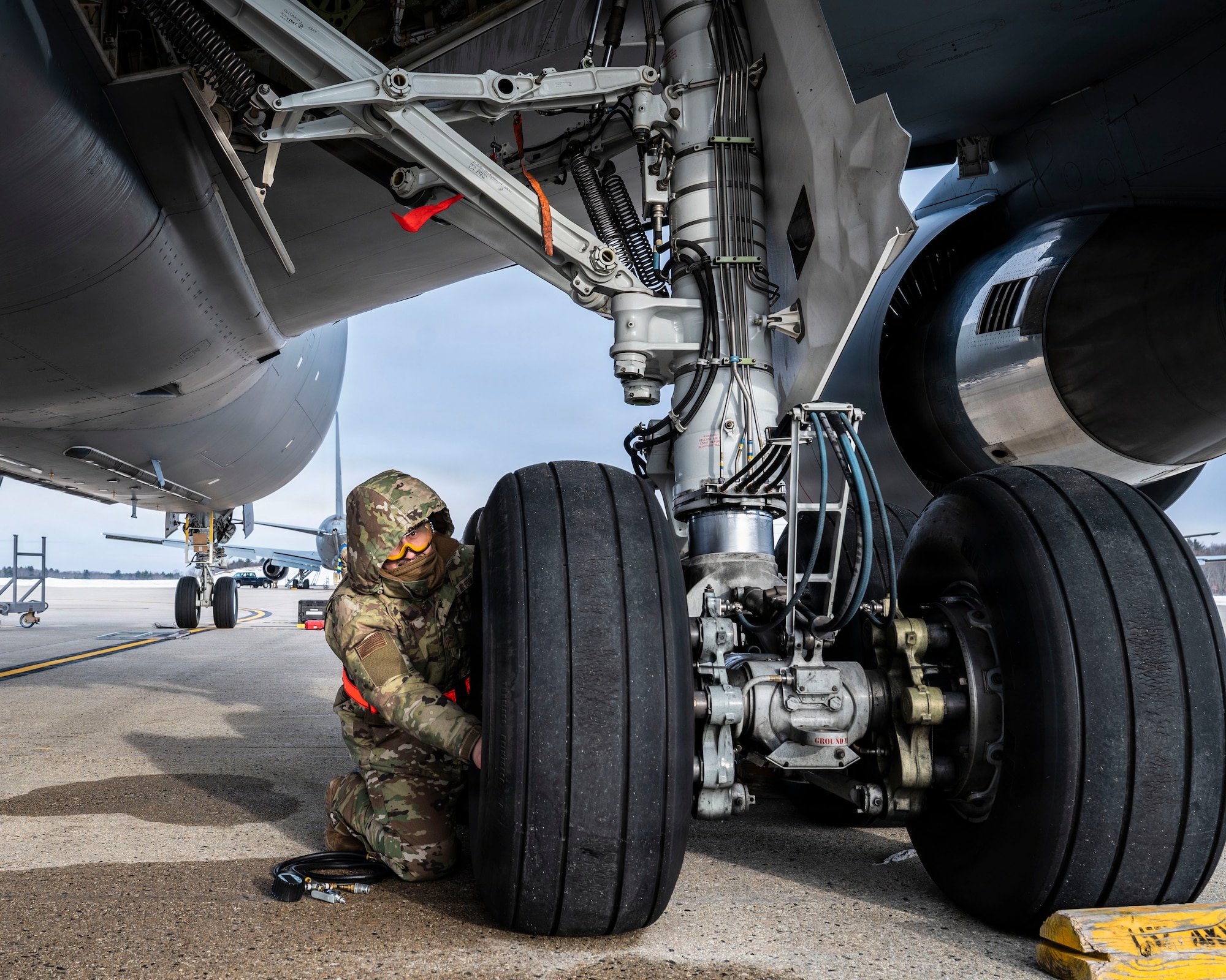 Maintainer works on aircraft