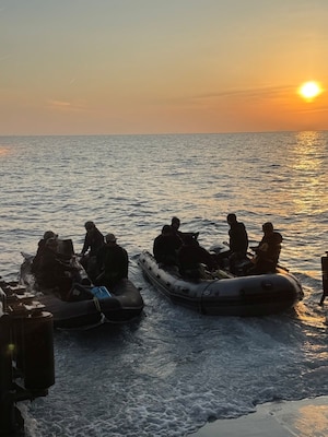 Explosive Ordnance Disposal Mobile Unit (EODMU) 5 and Japan Maritime Self-Defense Force (JMSDF) EOD teams launch from the Uraga-class mine countermeasure vessel JS Bungo (MST-464) to complete unmanned underwater vehicle operations during Mine Warfare Exercise (MINEX) 1JA, Feb. 4, 2026. MINEX 1JA is part of a year-long series of bilateral exercise between the U.S. Navy and JMSDF to strengthen interoperability and increase proficiency in mine countermeasure operations. (U.S. Navy photo by Minemen Senior Chief Chris Gonzales Bouton)