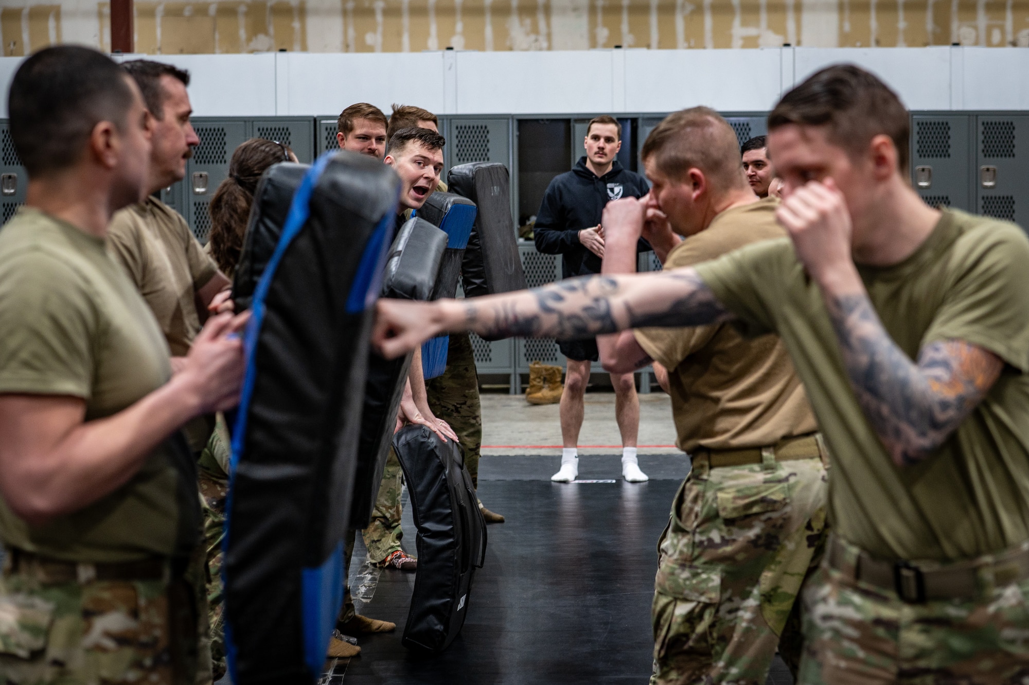Joint Base Elmendorf-Richardson Airmen practice striking during a combatives class in the Mission Ready Airman training portion of the Professional Development Center’s Noncommissioned Officer Foundation Course 500 at JBER, Alaska, Feb. 6, 2026. The MRA training is the first in Pacific Air Forces, allowing foundation course students to refresh their knowledge of warfighting skills, such as combatives, land navigation, use-of-force and land mobile radio systems. (U.S. Air Force photo by Senior Airman Hunter Hites)