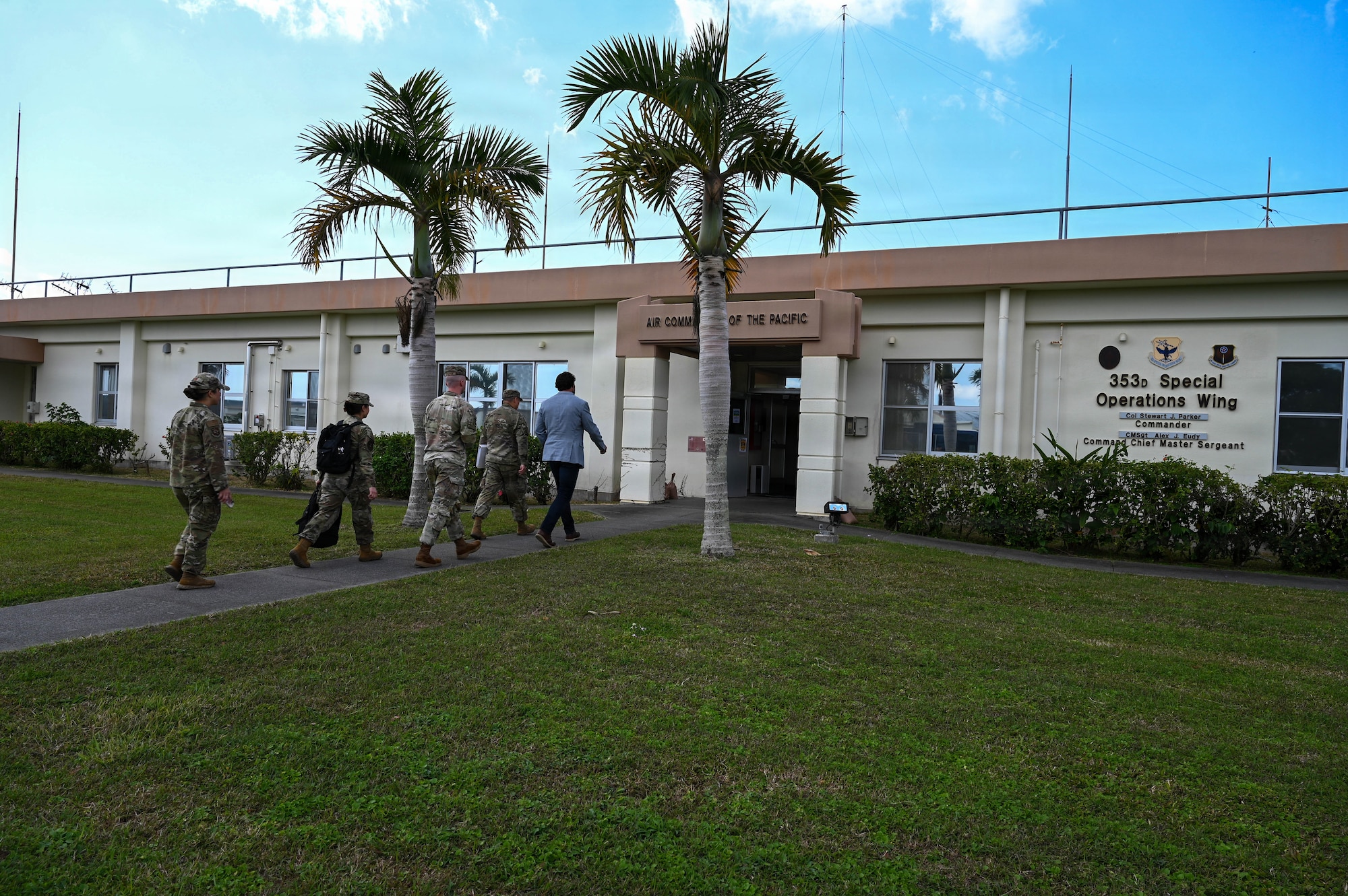 Service members give government official tour of base.