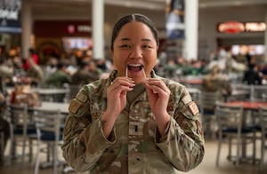 U.S. Air Force 1st Lt. Ira Frazier, 86th Logistics Readiness Squadron military installation deployment officer, performs a mouth swab on herself during a Salute to Life Program registration at Ramstein Air Base, Germany, Feb. 10, 2026. Participants completed self-administered cheek swabs used to determine human leukocyte antigen typing for potential future bone marrow or stem cell donation. Salute to Life is a Department of War authorized program operating in partnership with the National Marrow Donor Program to support patients in need of transplants. (U.S. Air Force photo by Senior Airman Jared Lovett)