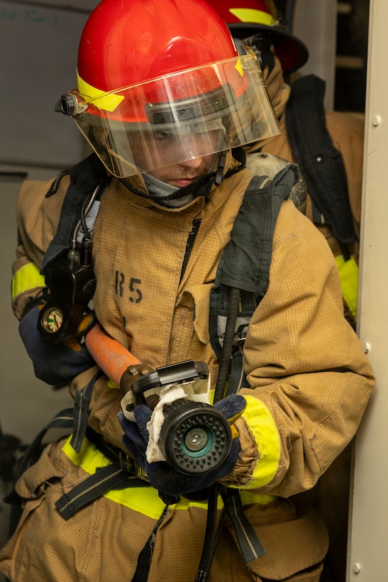 U.S. Navy Seaman Carson Barber, assigned to Arleigh Burke-class guided-missile destroyer USS Delbert D. Black (DDG 119), participates in a damage control drill in the Red Sea, Feb. 7, 2026. Delbert D. Black is deployed to the U.S. 5th Fleet area of operations to support maritime security and stability in the U.S. Central Command area of responsibility. (U.S. Navy photo by Mass Communication Specialist 1st Class Wendy Arauz)