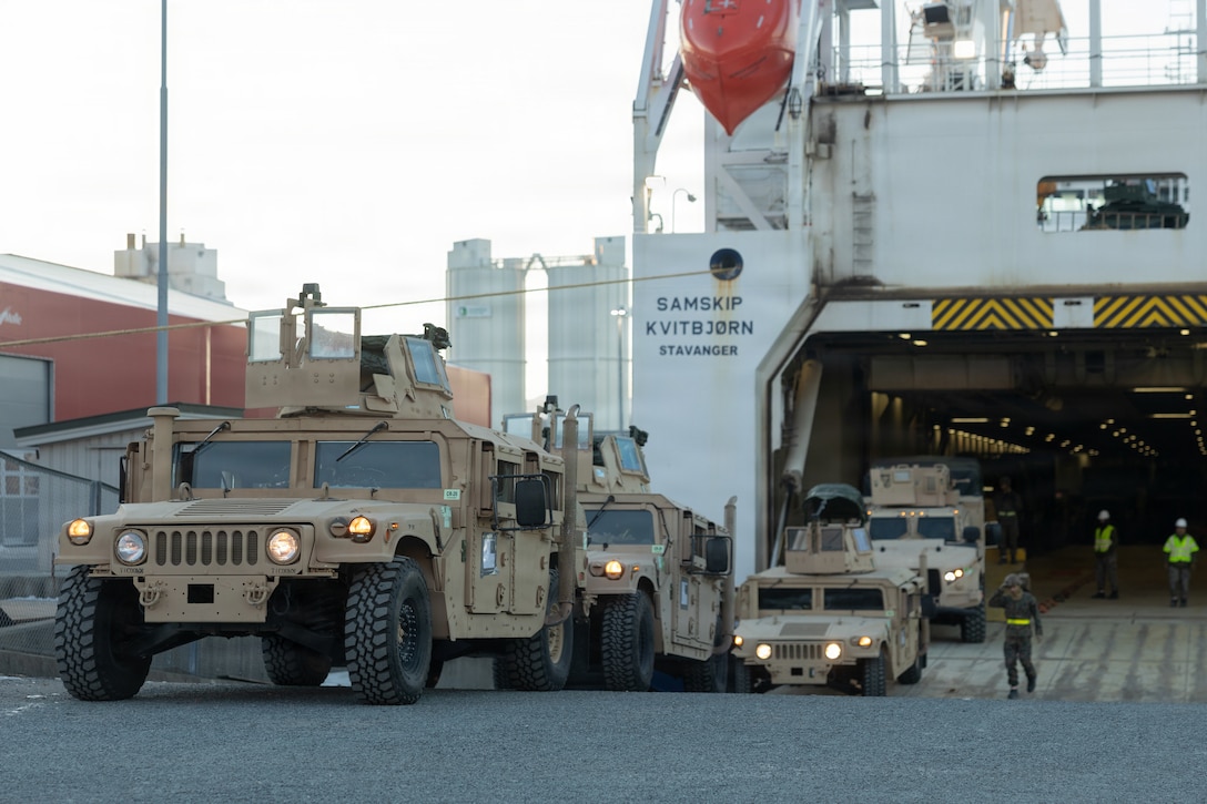 U.S. Marines with 2nd Distribution Support Battalion, Combat Logistics Regiment 27, 2nd Marine Logistics Group, prepare to load tactical vehicles onto the Norwegian roll-on/roll-off cargo ship Samskip Kvitbjorn in preparation for exercise Cold Response 26 in Verdalsora, Norway, Feb. 2, 2026. Exercise Cold Response 26 is a Norwegian-led winter military exercise designed to enhance collective defense capabilities and ensure U.S. readiness to rapidly deploy and seamlessly operate alongside NATO Allies in challenging Arctic conditions. (U.S. Marine Corps photo by Lance Cpl. Franco Lewis)