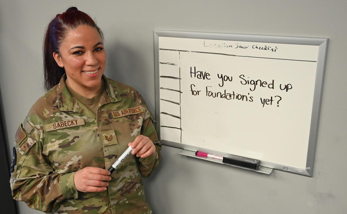 An Airman poses for a photo.